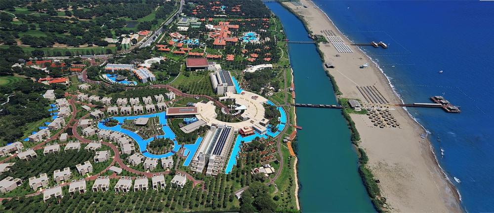 Ariel view of luxury hotel and resort on ocean